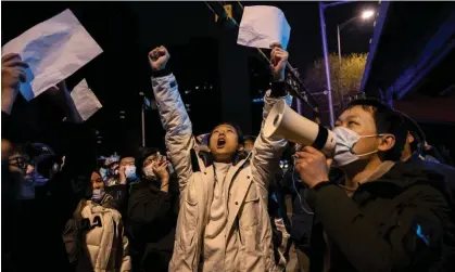  ?? ?? Protests in Beijing, 28 November 2022. Photograph: Kevin Frayer/Getty Images