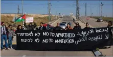  ??  ?? Israeli and Palestinia­n activists protest in the West Bank.