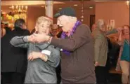  ?? JESI YOST — DIGITAL FIRST MEDIA ?? Boyertown Area High School National Honor Society seniors host a dance for senior citizens at Senior-Senior Prom held at The Center at Spring Street March 9.