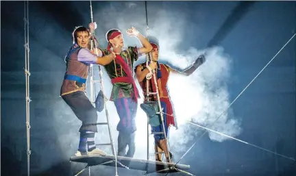  ?? PICTURE: KONSTANTIN STUKALOV ?? The Giant Trapeze act features daring young pirate look-a-likes from Belarus.