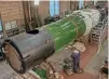  ?? JOHN TITLOW ?? With lagging fitted and refitting of casing underway, the boiler of No. 4930 Hagley Hall is seen inside the boiler shop at Bridgnorth on November 11.