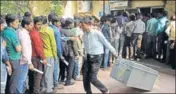  ??  ?? ■ Long queue outside an ATM after ₹500 and 1000 notes were demonetise­d in 2016. HT FILE/BURHAAN KINU