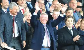  ??  ?? Alex Ferguson in the stands, at his first match since having emergency brain surgery in May, before the English Premier League soccer match against Wolverhamp­ton Wanderers Photo: AP