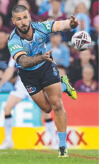  ?? Picture: AAP IMAGE ?? Nathan Peats does his job and gets the ball to the NSW halves.