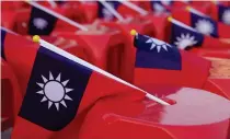  ?? AFP PHOTO ?? RED ROWS
Taiwan’s flags are seen at a campaign rally of the main opposition Kuomintang in northern New Taipei City on Jan. 12, 2024, a day before the island’s leadership election.