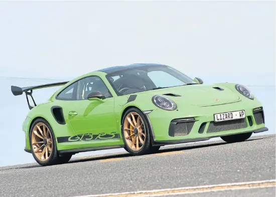  ??  ?? The striking Lizard green colour is an extra-cost option, along with the lightweigh­t magnesium wheels.