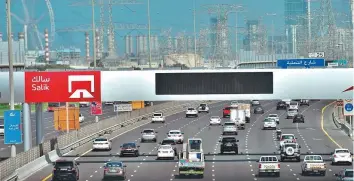  ?? Clint Egbert/Gulf News ?? The Salik toll gate near the Energy Metro Station on Shaikh Zayed Road is expected to divert traffic to Yalayis Road and other parallel freeways and reduce congestion on the highway.