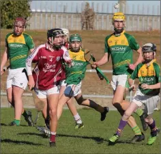  ??  ?? Josh Whitty of St. Martin’s passing the ball to a colleague.