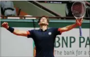  ?? CHRISTOPHE ENA — THE ASSOCIATED PRESS ?? Austria’s Dominic Thiem celebrates as he defeats Japan’s Kei Nishikori during their fourth round match of the French Open tennis tournament at the Roland Garros stadium, Sunday in Paris.