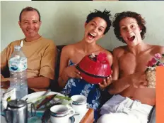  ??  ?? Both in their 70s, Mick and Di keep a busy schedule. As well as filming Gogglebox and their art interests, they volunteer and babysit their grandson, Harvey. Left: MIck with Alex and Victoria in Bali in 1999.