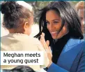  ??  ?? Meghan meets a young guest