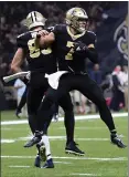  ?? BILL FEIG — THE ASSOCIATED PRESS ?? The New Orleans Saints’ Taysom Hill (7) is celebratin­g his touchdown with tight end Josh Hill in the second half of Monday night’s thrilling victory.