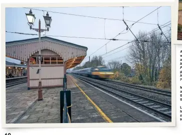  ?? PETER STERLING/ALAMY ?? Left: Some electrific­ation schemes utilized wire headspans to support the catenary. This is Hanwell station with the overhead wires installed for Heathrow Express.