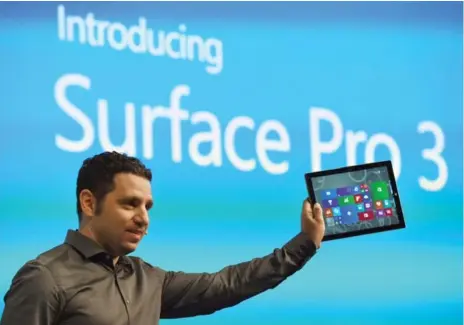  ?? STAN HONDA/AFP/GETTY IMAGES FILE PHOTO ?? Panos Panay, corporate vice-president of Microsoft’s Surface division, with the Surface Pro 3 tablet at a press conference in May 2014.