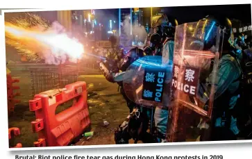  ?? ?? Brutal: Riot police fire tear gas during Hong Kong protests in 2019
