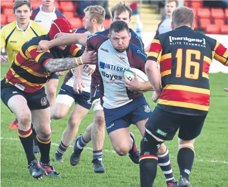 ?? ?? Scarboroug­h RUFC’s Vytautas Mudingis in action as his side powered to a home win against Bradford & Bingley PHOTO BY PAUL TAIT