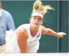  ??  ?? Coco Vandeweghe in action during her first round match against Mona Barthel at the Wimbledon Championsh­ips at The All England Lawn Tennis Club in Wimbledon, southwest London. — Reuters photo