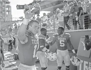  ?? JAY JANNER/ AUSTIN AMERICAN STATESMAN ?? Sam Ehlinger threw for 11,436 yards and 94 TDs in four seasons at Texas.