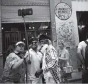  ?? Ramon Espinosa, The Associated Press ?? Tourists take a selfie at the Bodeguita Del Medio bar in Havana, Cuba.