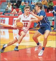  ?? Charlie Qualls, Warriors In Motion Photograph­y ?? LFO’s Brent Bowman drives in the lane against Gordon Lee’s Will McCutcheon during Friday’s Region 6-AAA game at LFO. The senior had 37 points and became the all-time leading scorer in the history of the school’s boys’ program.