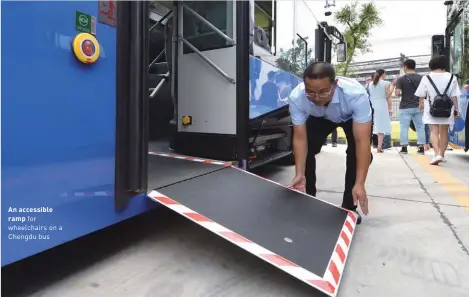  ?? ?? An accessible ramp for wheelchair­s on a Chengdu bus