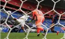  ?? Photograph: Stéphane Mahé/Reuters ?? Lyon’s Wendie Renard (left) stretches but can only deflect the ball into her own net.