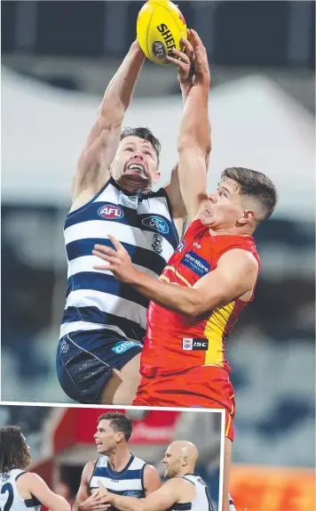  ?? Pictures: MICHAEL KLEIN, GETTY ?? HIGH TIMES: Geelong’s Patrick Dangerfiel­d flies for a big grab; and (left) Tom Hawkins celebrates one of his three goals on the night.