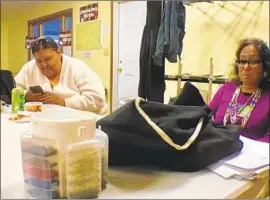  ?? Jenni Monet For The Times ?? STANDING ROCK SIOUX citizens Elizabeth Standing Crow, left, and Phyllis Young are worried their votes won’t be counted as officials try for a workaround.