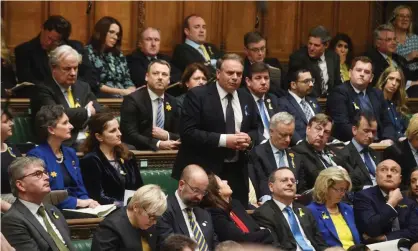  ?? Photograph: UK Parliament/Jessica Taylor/PA ?? Neil Parish stands to ask a question during prime minister’s questions in the Commons.