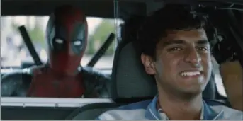  ?? TWENTIETH CENTURY FOX VIA AP ?? This image released by Twentieth Century Fox shows Ryan Reynolds and Karan Soni in a scene from “Deadpool 2.”