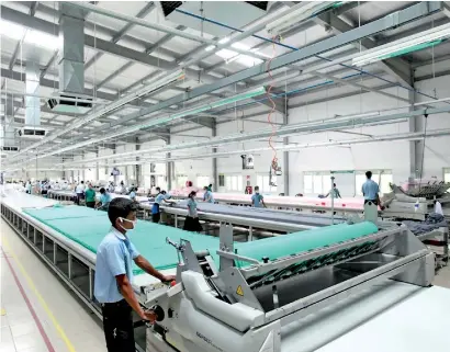  ??  ?? File picture of a Sri Lankan apparel factory. Apparel is the main Sri Lankan product that has opened factories overseas.