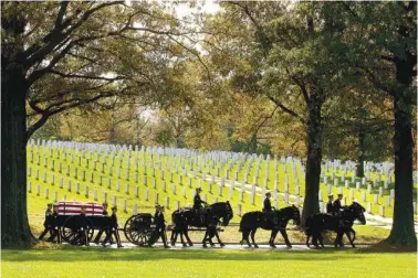  ?? AP PHOTO/KEVIN WOLF ?? A U.S. Army Caisson team carries the remains of Army Pfc. Tramaine J. Billingsle­y during a 2010 burial service at Arlington National Cemetery in Arlington, Va.
