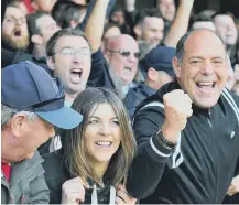  ??  ?? Happier times: Fans celebrate in the first half