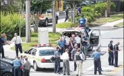  ?? JOSHUA MCKERROW / CAPITAL GAZETTE / TNS ?? Police said officers raced to the scene, arriving in 60 seconds, and took the gunman into custody without an exchange of gunfire.