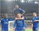  ??  ?? Happy days: Jamie Vardy celebrates scoring at the Emirates last month