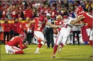  ?? CHARLIE RIEDEL / AP ?? Chiefs kicker Harrison Butker hit a pair of fourth-quarter field goals, including the go-ahead 34-yarder with 1:07 left Monday night, in a 20-17 KC win.