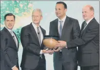  ?? PICTURE: PA ?? AWARD : CEO of Apple, Tim Cook, with IDA CEO Martin Shanahan, Taoiseach Leo Varadkar and Frank Ryan IDA Chairman.