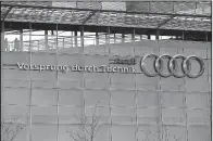  ?? AP/MATTHIAS SCHRADER ?? The four ring logo of German automaker Audi is shown at its headquarte­rs after its annual news conference in Ingolstadt, Germany, in March.