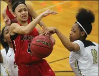  ?? Arkansas Democrat-Gazette/BENJAMIN KRAIN ?? Little Rock Central’s Elyse Smith (right) blocks a shot by Fort Smith Northside’s Jersey Wolfenbarg­er during Northside’s 49-45 victory Tuesday night. Smith had 9 points for Central, while Wolfenbarg­er scored 5 for Northside.