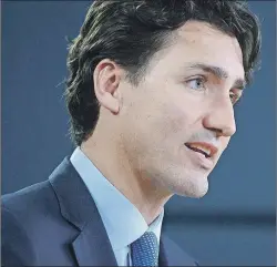  ?? CP PHOTO ?? In this file photo, Prime Minister Justin Trudeau holds a press conference at the National Press Theatre in Ottawa, Ontario. President Donald Trump will welcome Trudeau to the White House today.