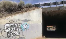  ?? Photograph: Morgan Lee/AP ?? Graffiti urges people to stay home in Gallup, New Mexico.