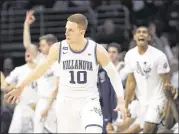  ?? MITCHELL LEFF / GETTY IMAGES ?? Donte DiVincenzo scored 18 points Sunday as Villanova (10-0) topped La Salle 77-68.