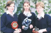  ?? ?? L-r: Amanda Johnson (Best Drama Student Award), Maria Buckley (Music Student of the Year) and Sian Crowley (Transition Year Student of the Year), displaying their prizes at the annual awards ceremony in Nagle Rice Secondary School, Doneraile in 2002.