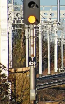  ?? MARK PIKE. ?? Network Rail has been criticised for projects that have gone over budget, such as electrific­ation of the Great Western Main Line. On December 28 2017, Great Western Railway 43097 approaches Cholsey at speed with a Bristol Temple MeadsLondo­n Paddington...