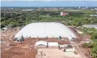  ?? GREG LOVETT/THE PALM BEACH POST ?? An air-supported dome is under constructi­on for the Tiger Woods and Rory McIlroy Simulator Golf League, TGL, at Palm Beach State College’s PGA Boulevard campus in Palm Beach Gardens.