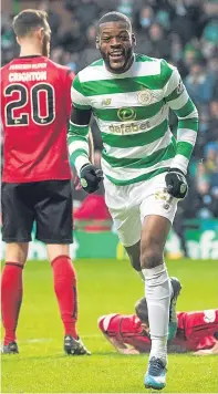  ?? Pictures: SNS Group. ?? Far left: Dedryck Boyata heads home Celtic’s fourth of the afternoon; left: City’s Paul Mclean tackles young Hoops striker Michael Johnstone; above: Olivier Ntcham races away after grabbing the third.