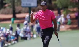  ?? Photograph: Tannen Maury/EPA ?? Five-time champion Tiger Woods stunned the sporting world with his unexpected return and opened with a creditable round of 71.