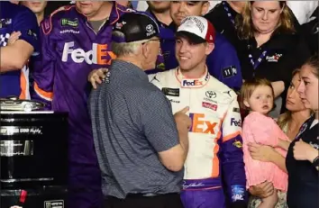  ?? Jared C. Tilton/Getty Images ?? Denny Hamlin of Joe Gibbs Racing dedicated his Daytona 500 win to the late J.D. Gibbs.