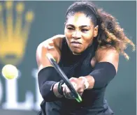  ??  ?? Serena Williams reaches for a backhand in her match against Venus Williams of the United States during the BNP Paribas Open at the Indian Wells Tennis Garden in Indian Wells, California. — AFP photo