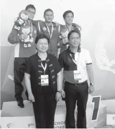  ?? PSC PHOTO ?? MAURICE SACHO Ilustre emerges as the most bemedalled Filipino tanker in the 9th Asean Schools Games with four golds. He copped yet another gold medal in the boys 200m butterfly Wednesday afternoon at the Singapore Sports School.